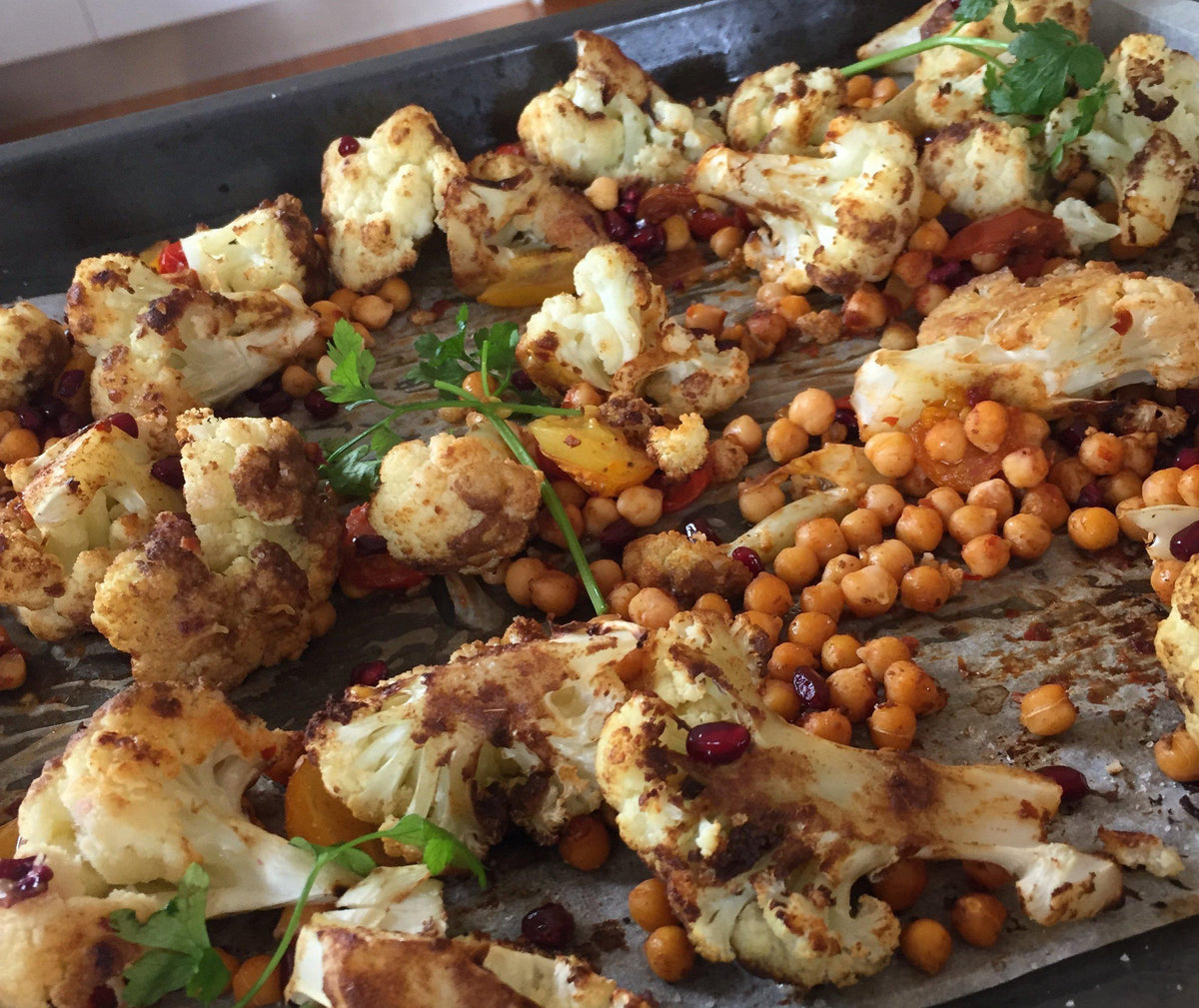 Roasted, spicy cauliflower and chickpea salad with pomegranate seeds — Fresh Connection
