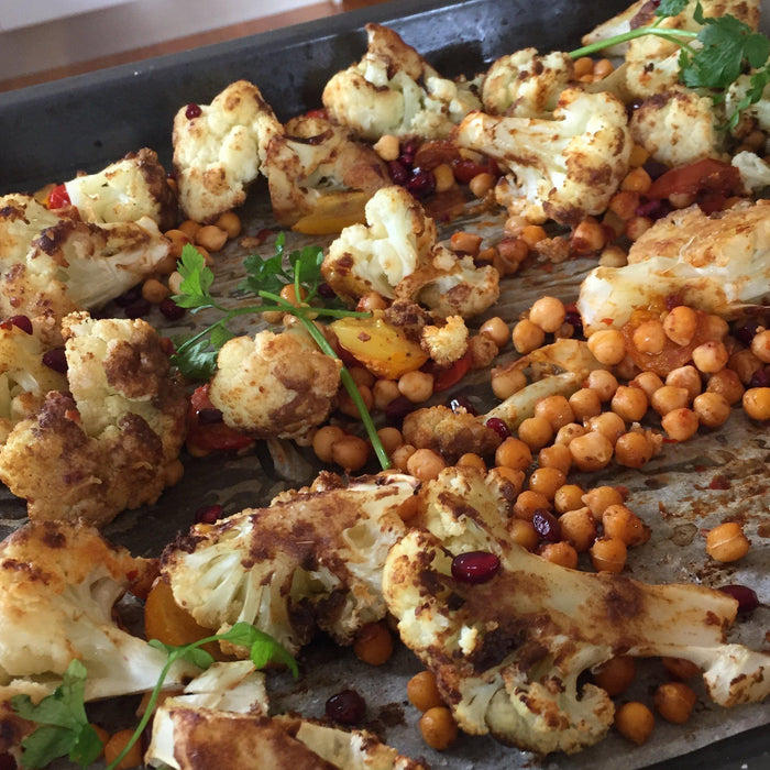 Roasted, spicy cauliflower and chickpea salad with pomegranate seeds-Fresh Connection