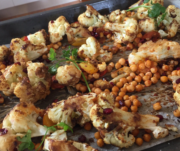 Roasted, spicy cauliflower and chickpea salad with pomegranate seeds-Fresh Connection